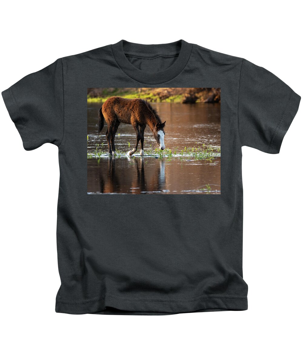 Wild Horses Kids T-Shirt featuring the photograph River foal by Mary Hone