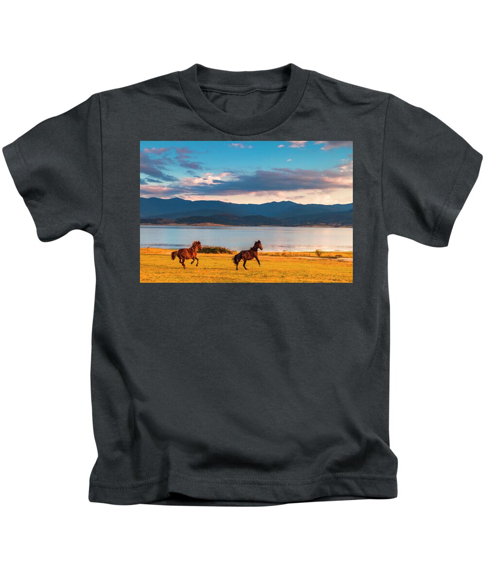 Animal Kids T-Shirt featuring the photograph Running Horses by Evgeni Dinev