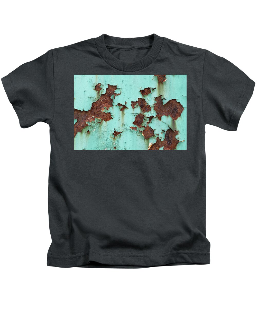 Metal Kids T-Shirt featuring the photograph Rusty Metal Background With Peeling Paint by Artur Bogacki