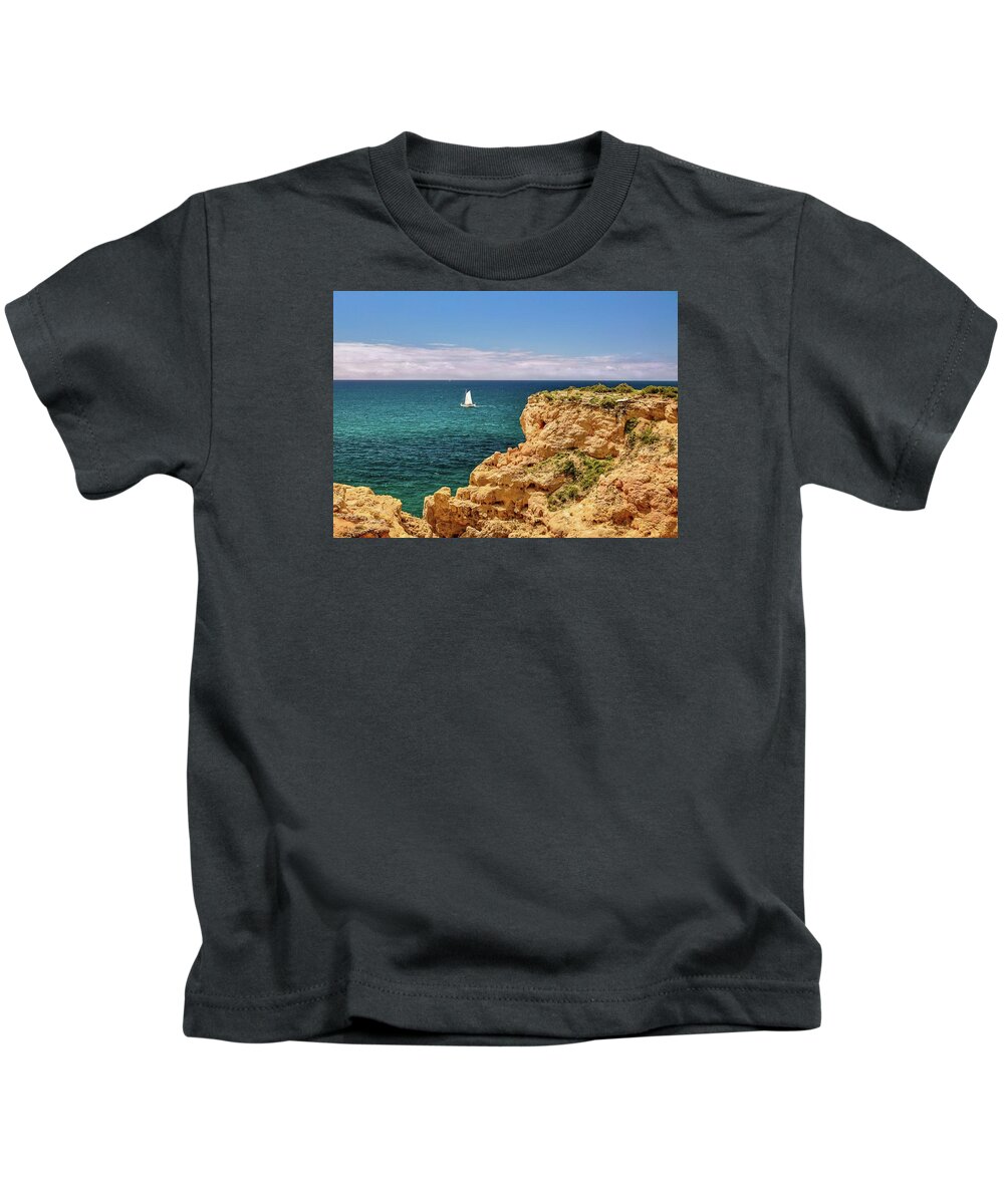 Algarve Coast Kids T-Shirt featuring the photograph Sailing Off the Algarve Coast in Portugal by Rebecca Herranen