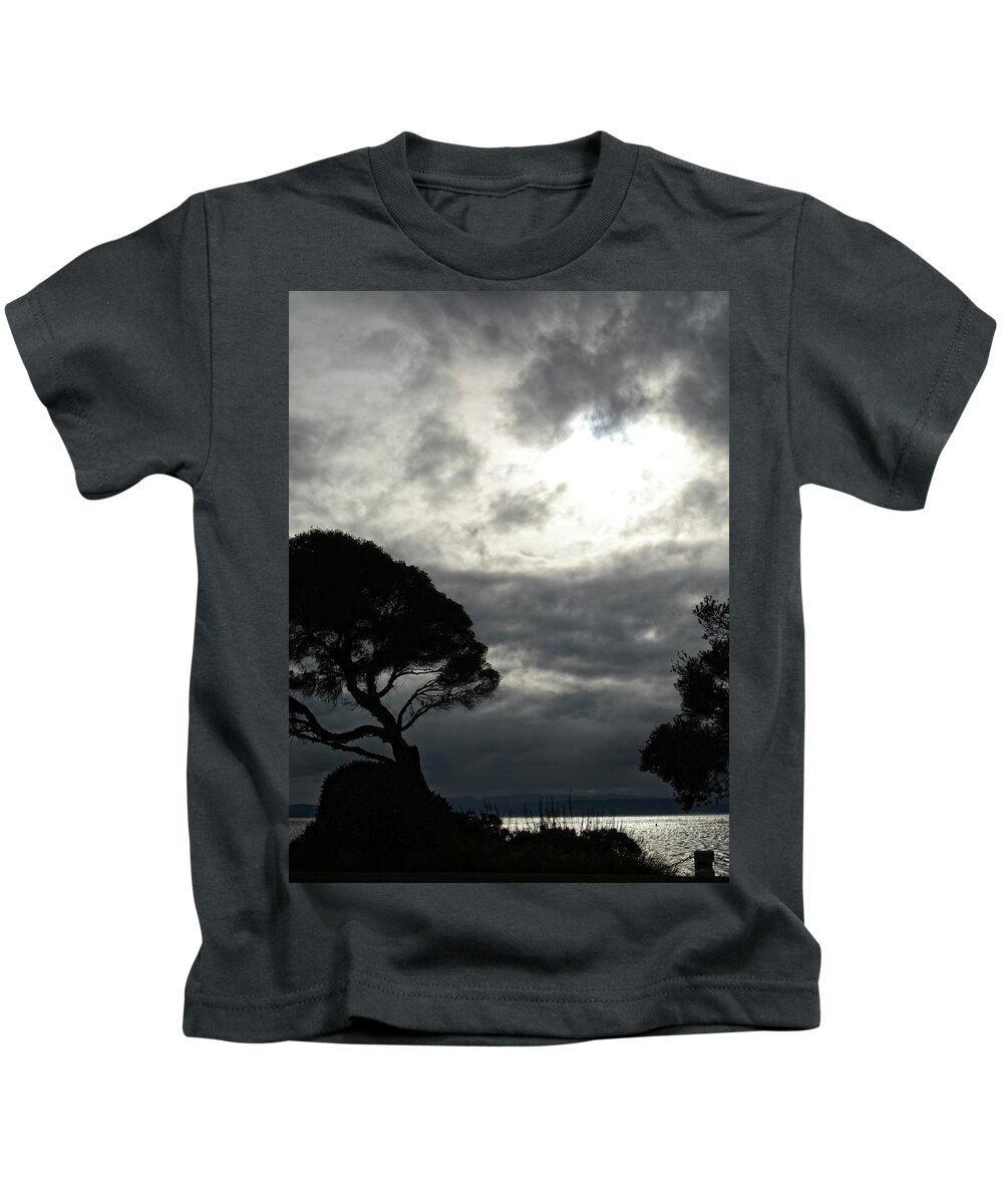 Water Kids T-Shirt featuring the photograph Silhouetted Tree by Maggy Marsh