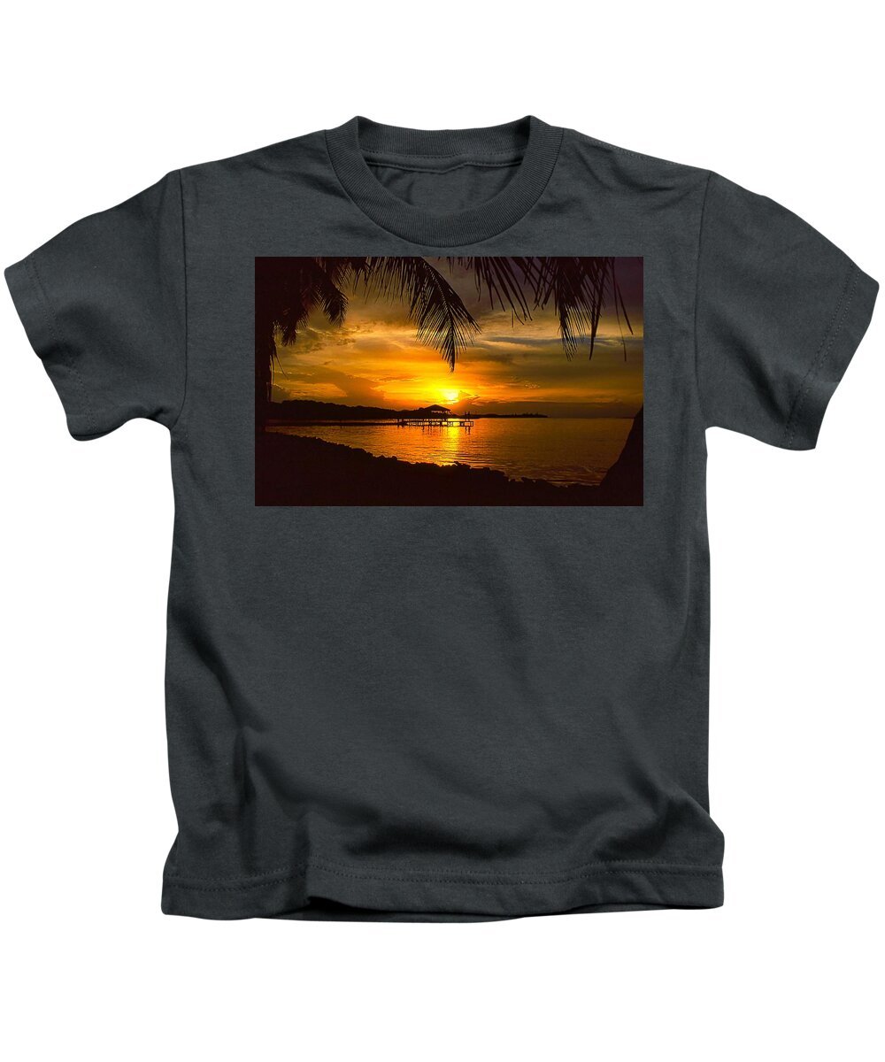 Sunset Kids T-Shirt featuring the photograph Sunset on Roatan by Stephen Anderson