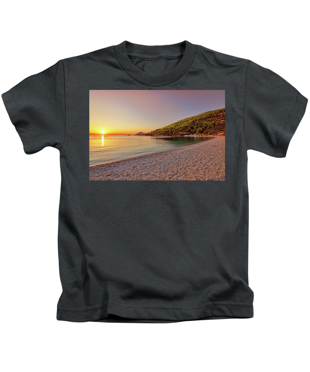 Island Kids T-Shirt featuring the photograph The sunset at the beach Panormos of Skopelos, Greece by Constantinos Iliopoulos