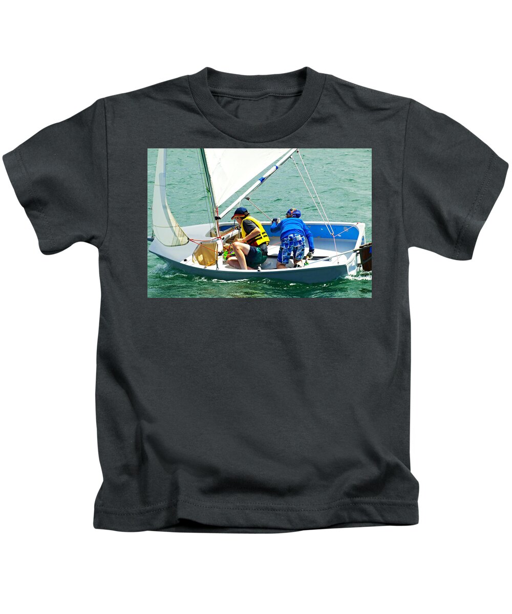Csne1b Kids T-Shirt featuring the photograph Two Boys Sailing in a small boat on salt water. by Geoff Childs