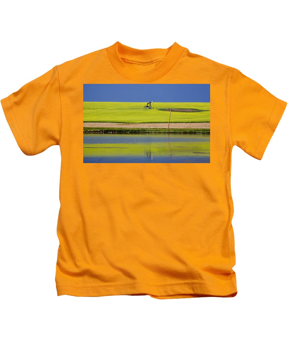 Industry Kids T-Shirt featuring the photograph Oil Jack Reflection Saskatchewan by Mark Duffy