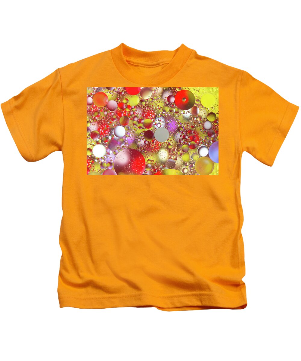 Abstract Kids T-Shirt featuring the photograph Colorful Bubbles in Oily Water by Charles Floyd