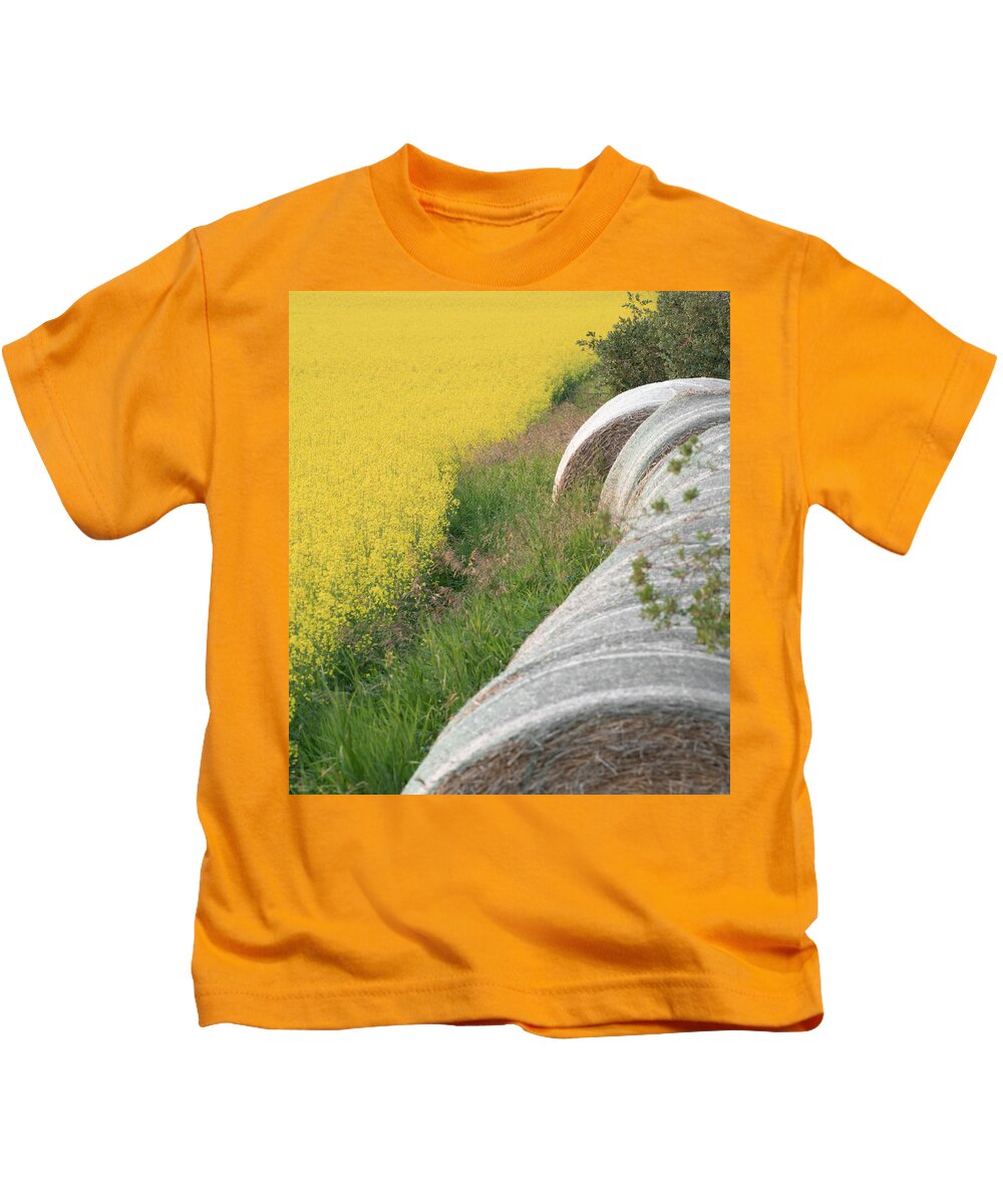 Hay Kids T-Shirt featuring the photograph Hay Bales And Rapeseed by Karen Rispin