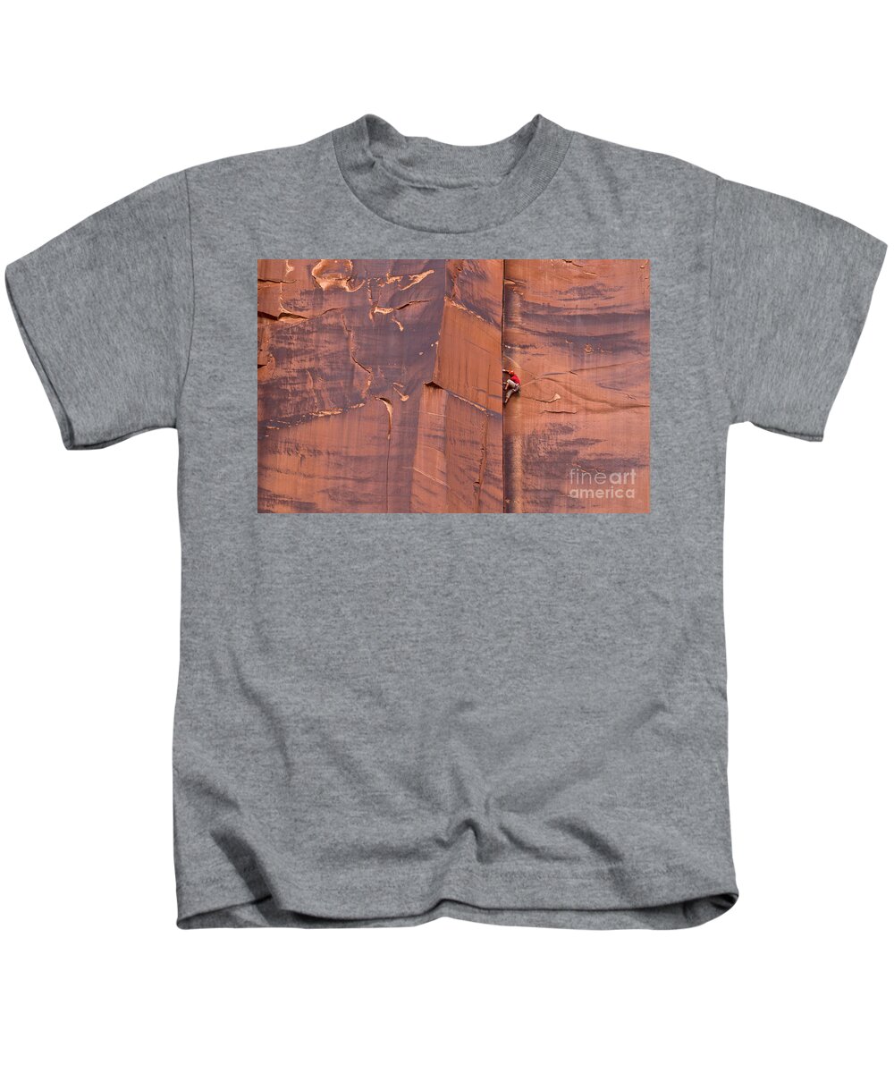 00559218 Kids T-Shirt featuring the photograph Rock Climber Indian Creek Utah by Yva Momatiuk John Eastcott