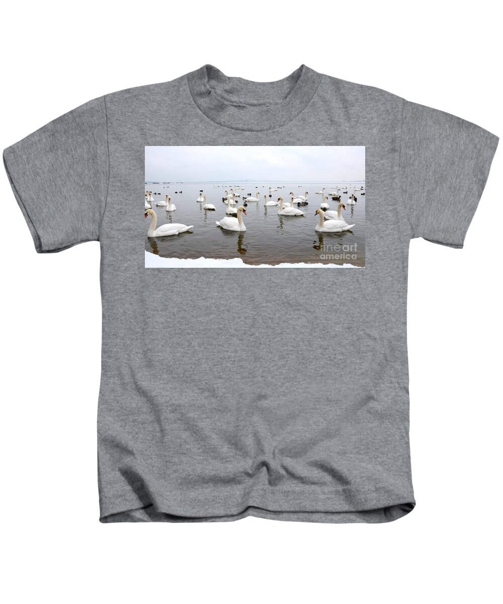 Swans Kids T-Shirt featuring the 60 Swans a Swimming by Laurel Best