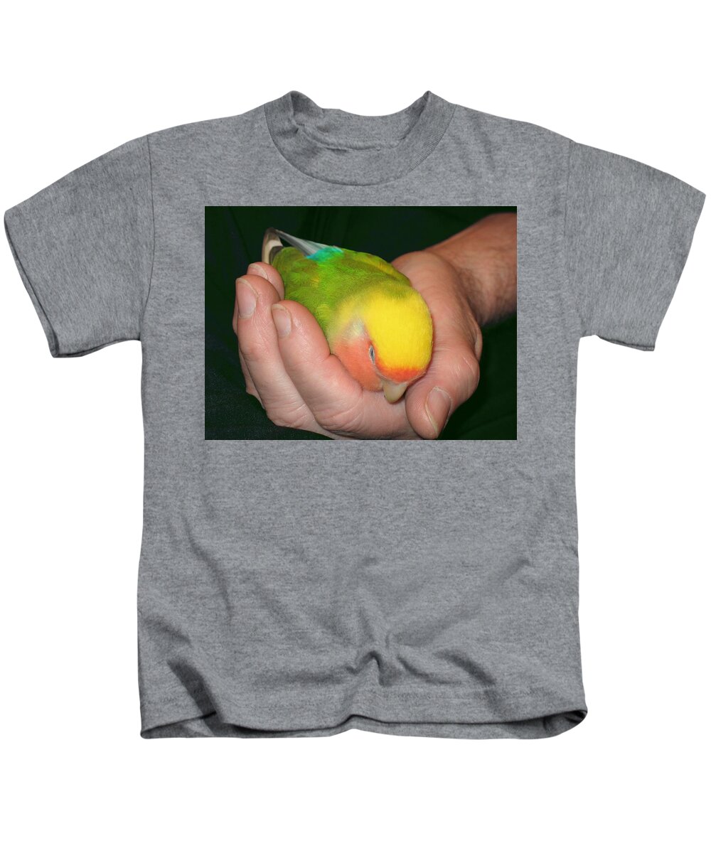 Lovebird Kids T-Shirt featuring the photograph A Bird in the Hand by Andrea Lazar