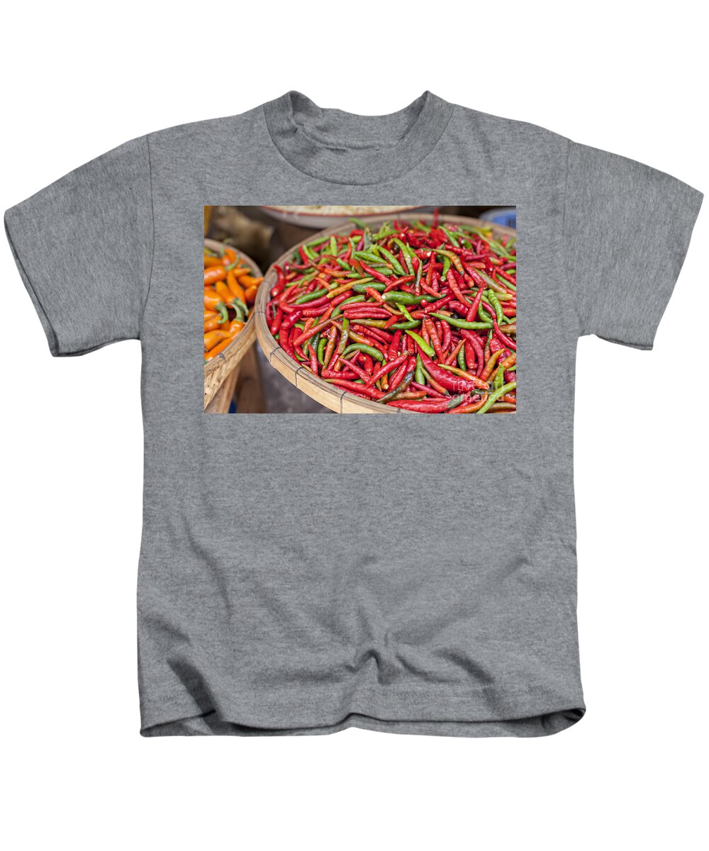 Chili Kids T-Shirt featuring the photograph Food market with fresh chili peppers by Sophie McAulay