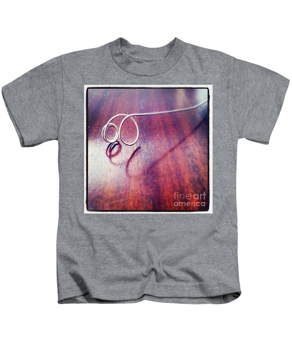 Guitar String Kids T-Shirt featuring the photograph Guitar String by Denise Railey