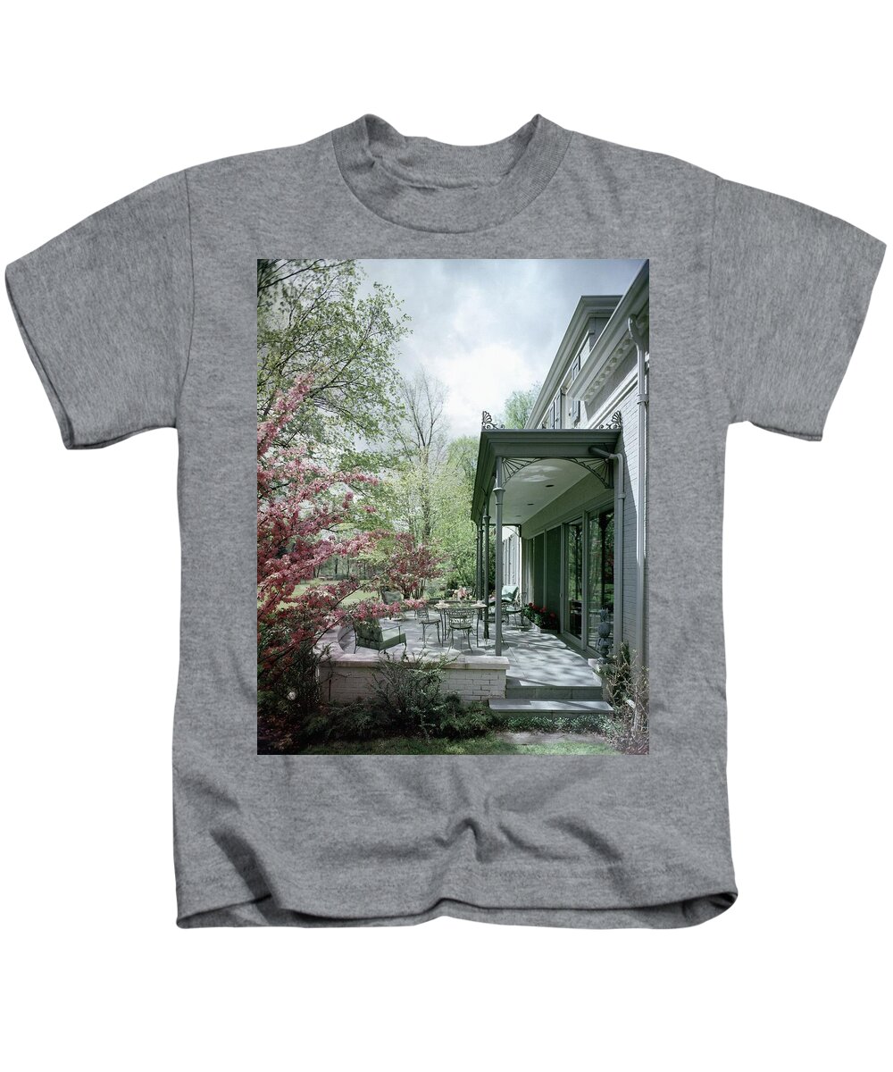 Garden Kids T-Shirt featuring the photograph Hollis Baker's Patio by Pedro E. Guerrero