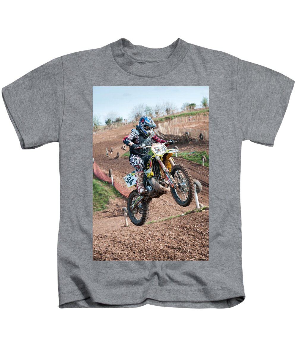 Motorcross Kids T-Shirt featuring the photograph Motocross leap by Roy Pedersen