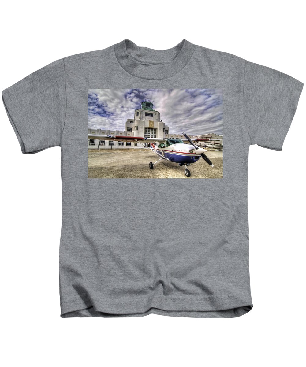 Airplane Kids T-Shirt featuring the photograph On the Tarmac by Tim Stanley