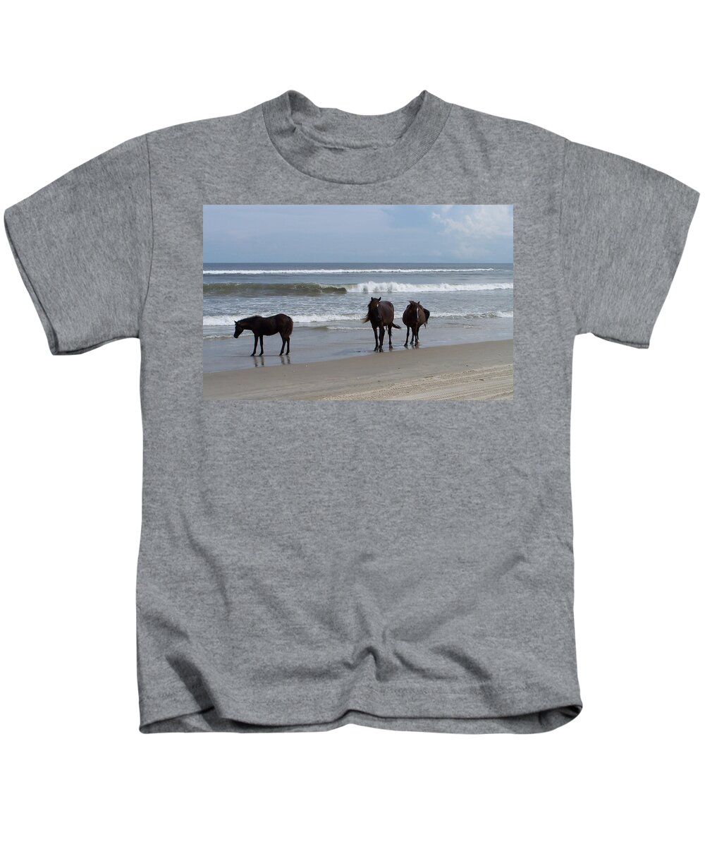 Wild Spanish Mustangs Kids T-Shirt featuring the photograph Shoreline Stroll by Kim Galluzzo