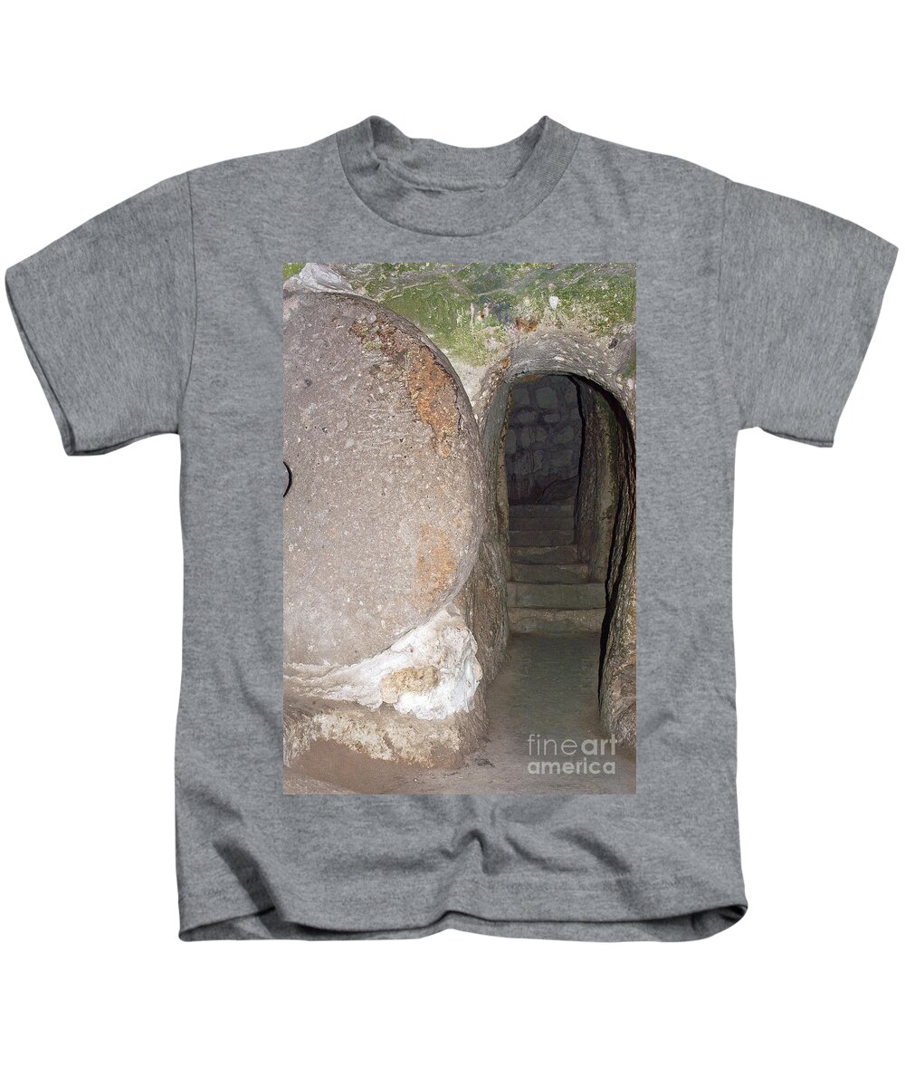 Derinkuyu Kids T-Shirt featuring the photograph Stone Door by Bob Phillips