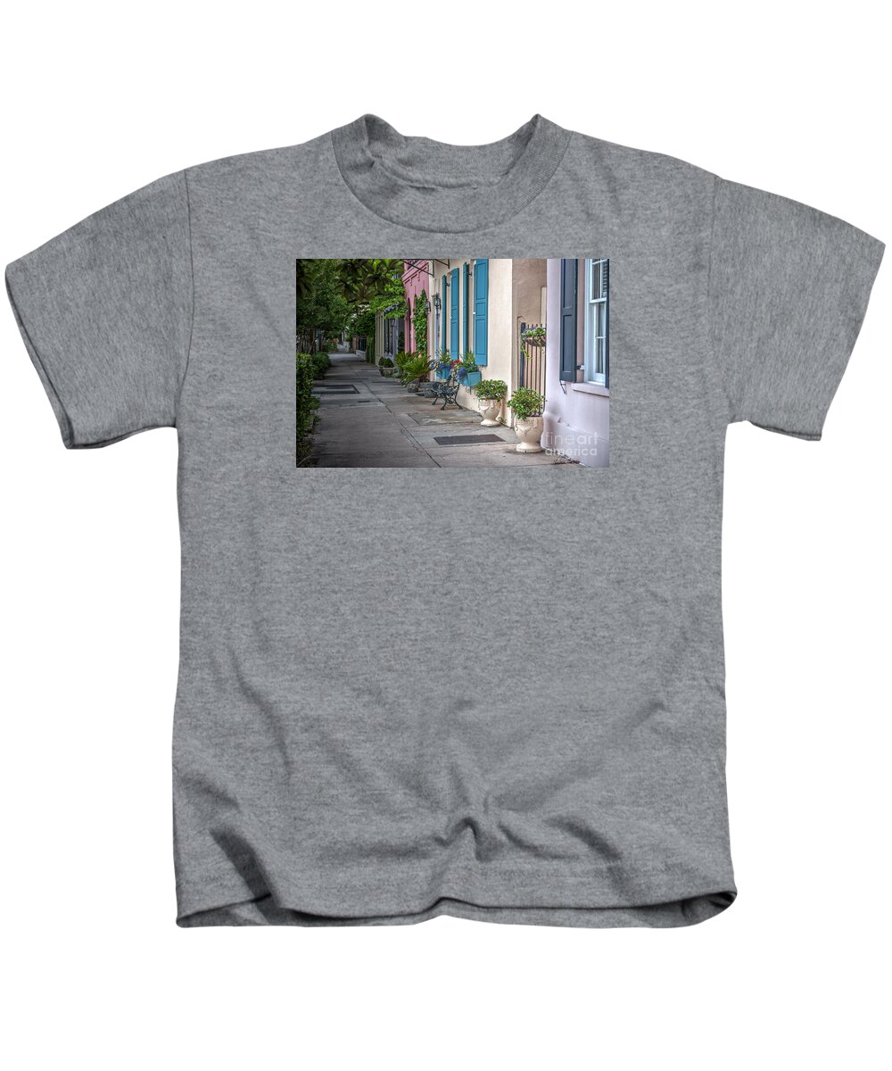 Rainbow Row Kids T-Shirt featuring the photograph Strolling Down Rainbow Row by Dale Powell