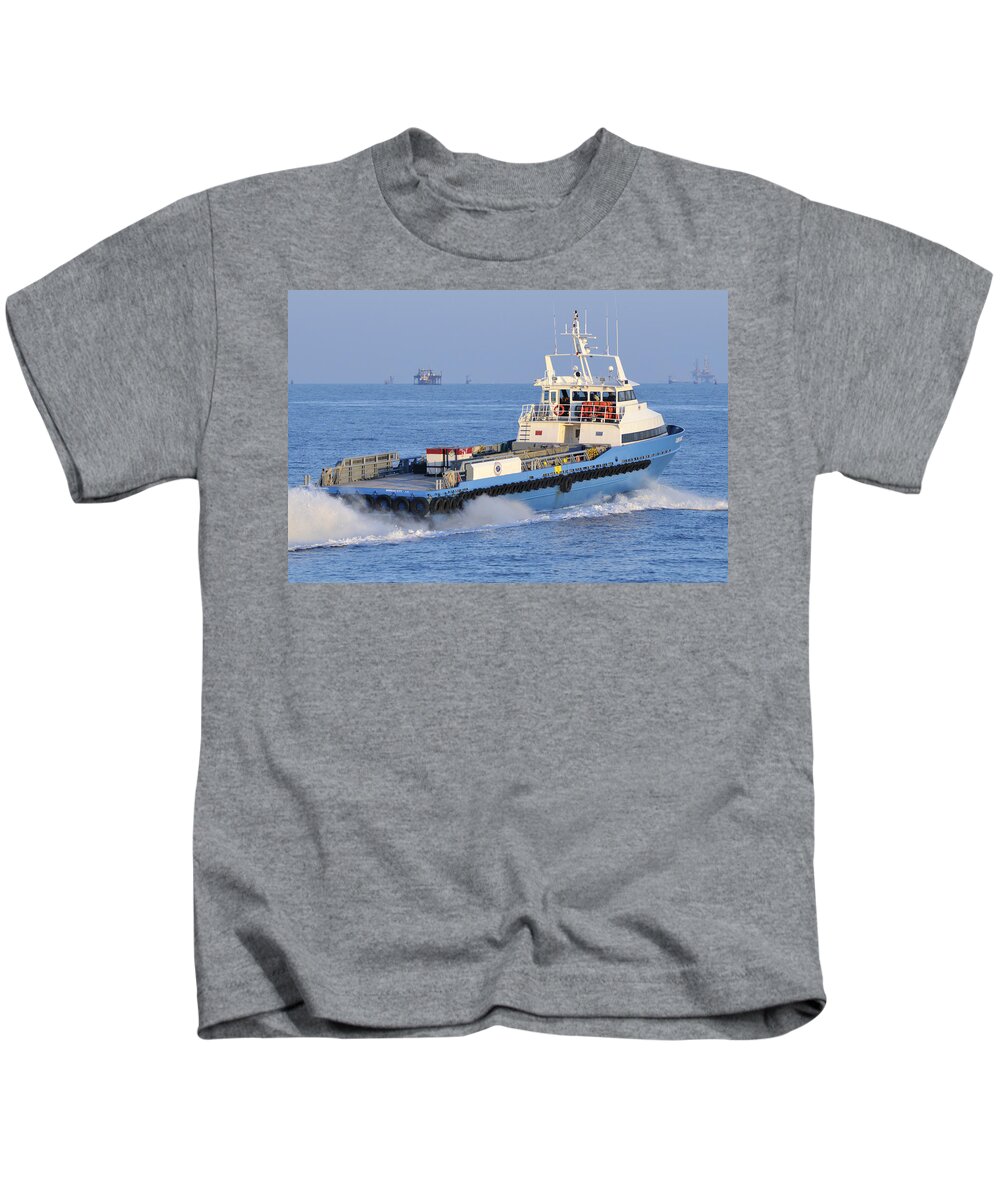Supply Vessel Kids T-Shirt featuring the photograph Supply Vessel heads to sea by Bradford Martin