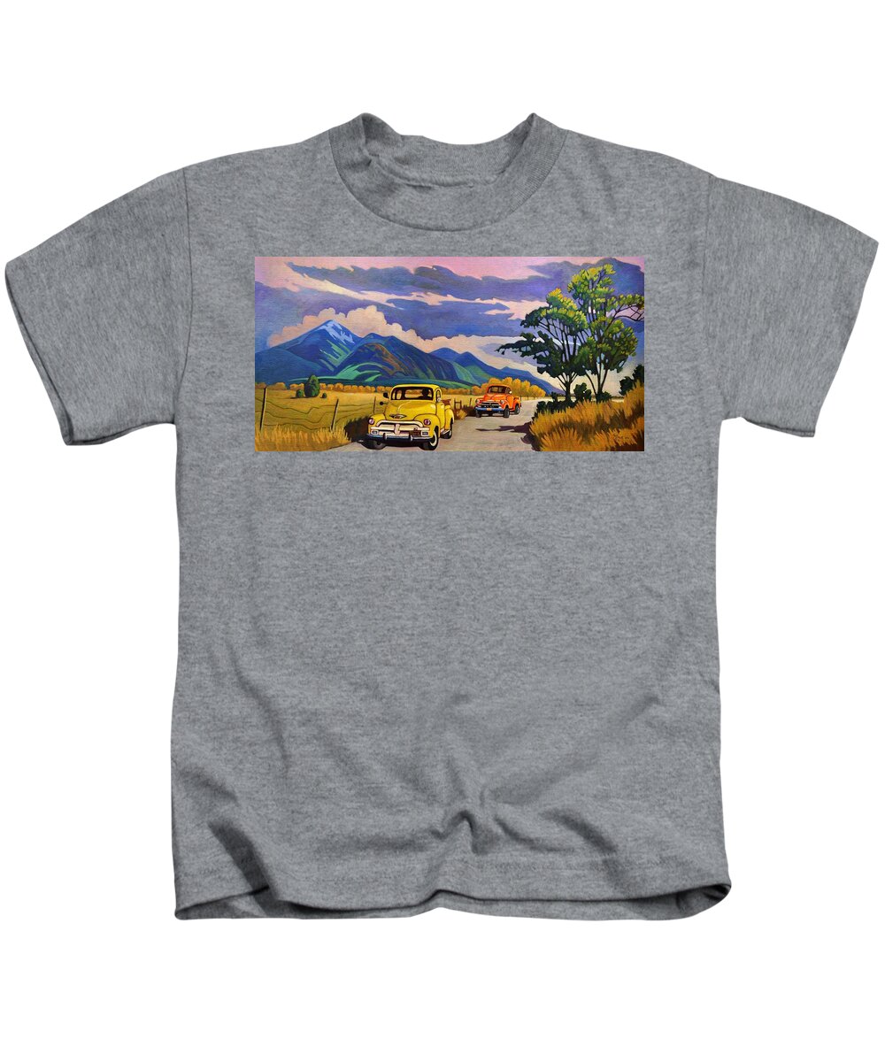 Vintage Kids T-Shirt featuring the painting Taos Joy Ride with Yellow and Orange Trucks by Art West