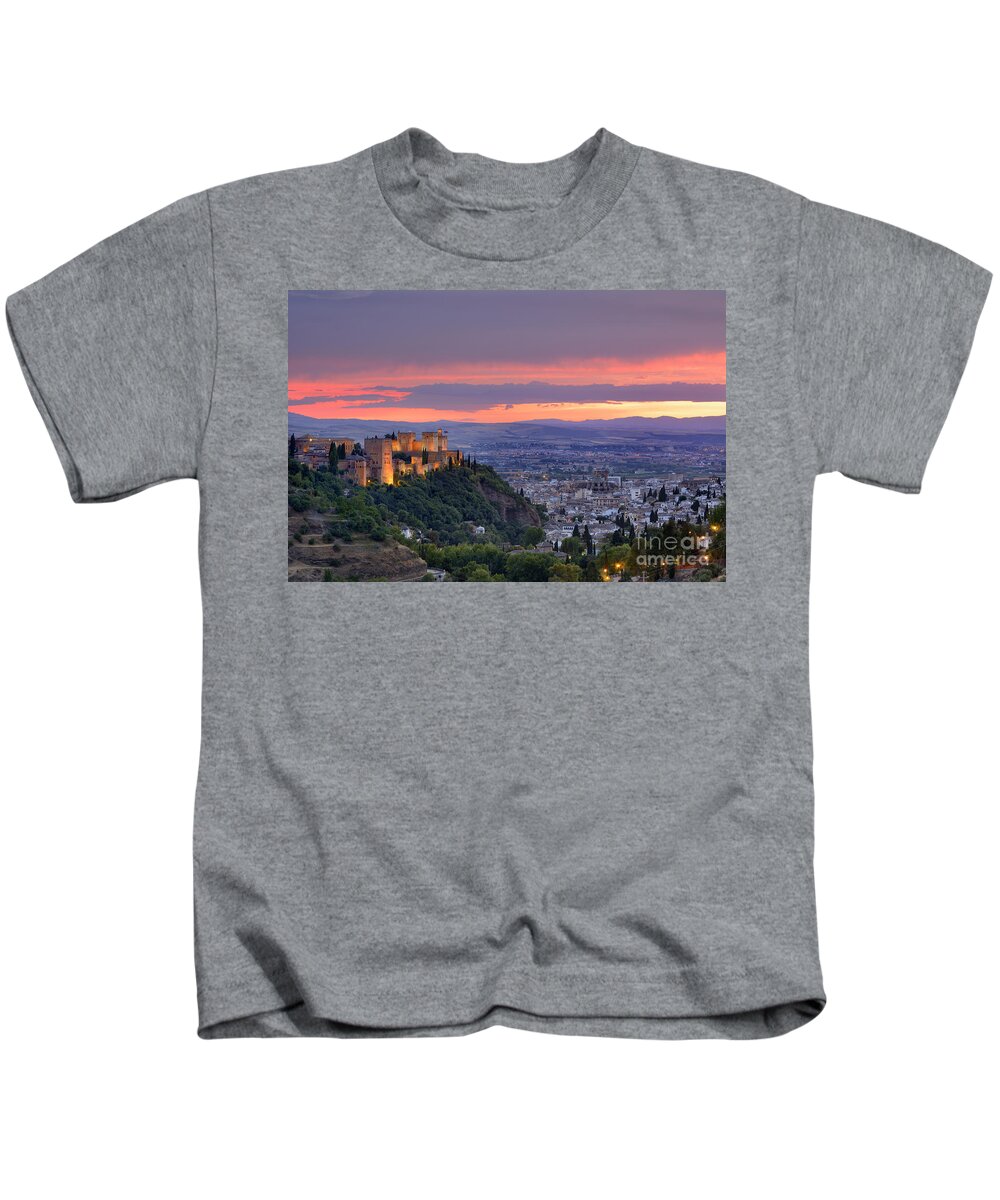 The Alhambra Kids T-Shirt featuring the photograph The alhambra and Granada city at sunset by Guido Montanes Castillo