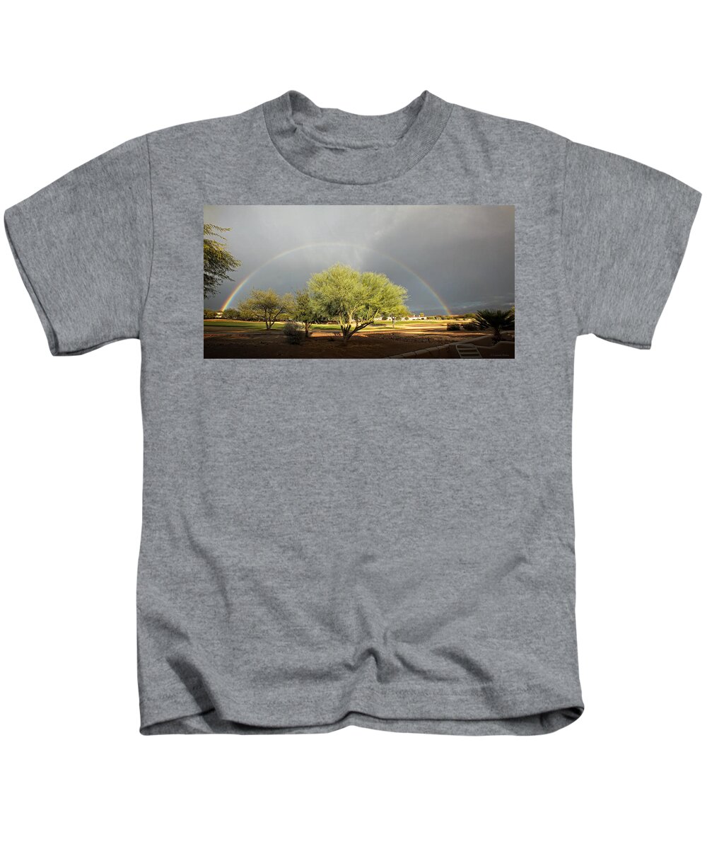 Rainbow Kids T-Shirt featuring the photograph The Rain and The Rainbow by Lucinda Walter