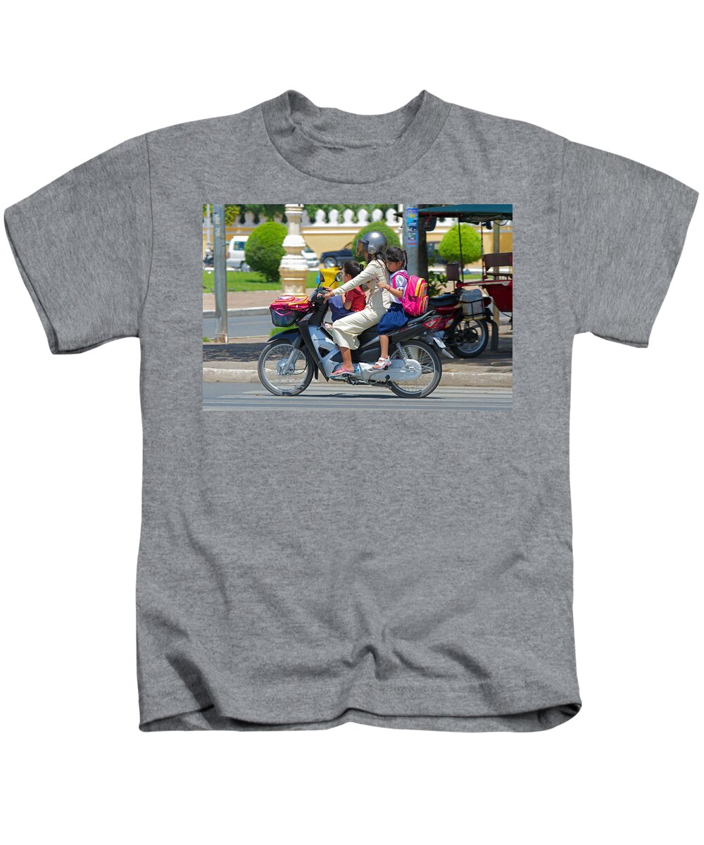 Asia Kids T-Shirt featuring the photograph A ride to school. by David Freuthal