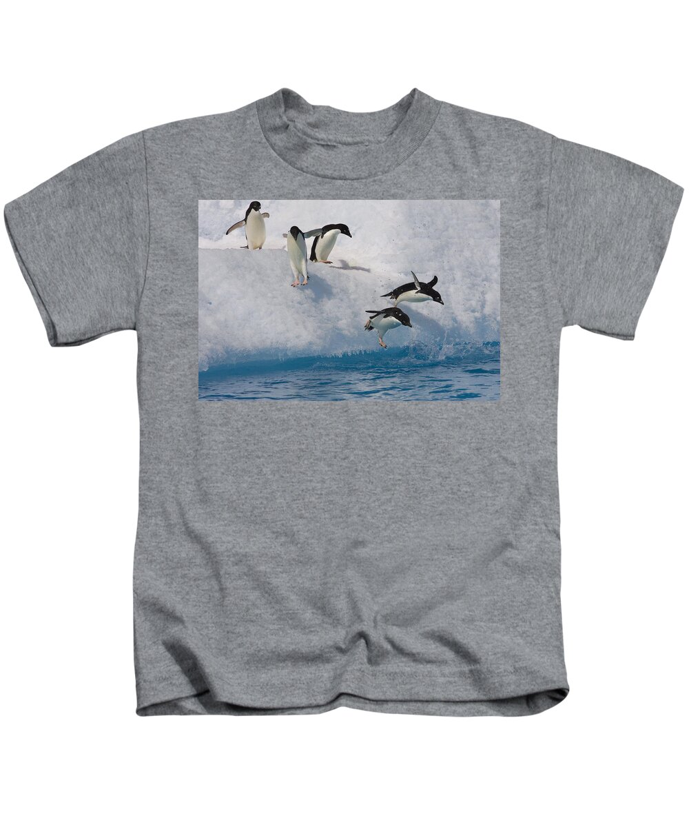00761826 Kids T-Shirt featuring the photograph Five Adelie Penguins Leaping by Suzi Eszterhas
