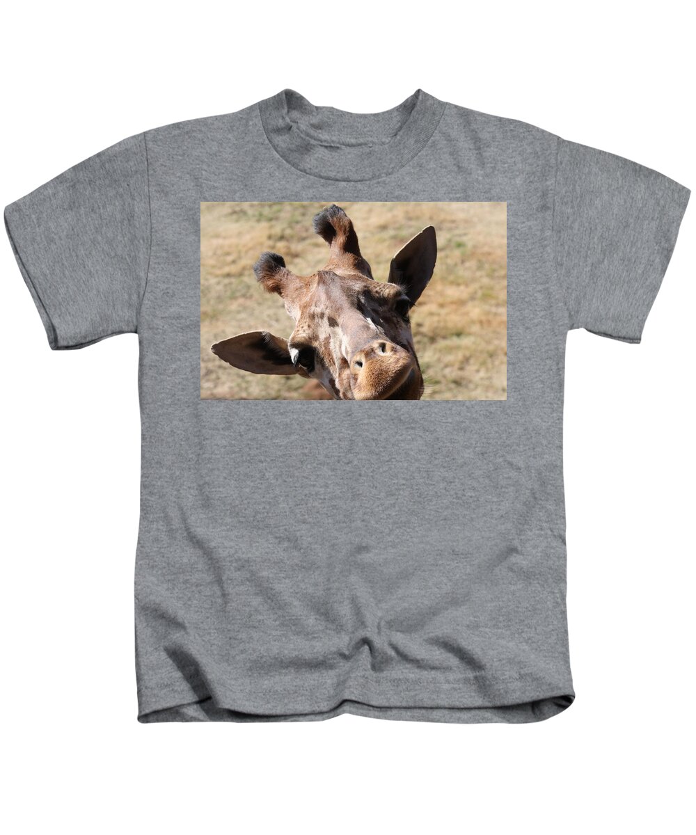 Giraffe Kids T-Shirt featuring the photograph What A Face by Kim Galluzzo