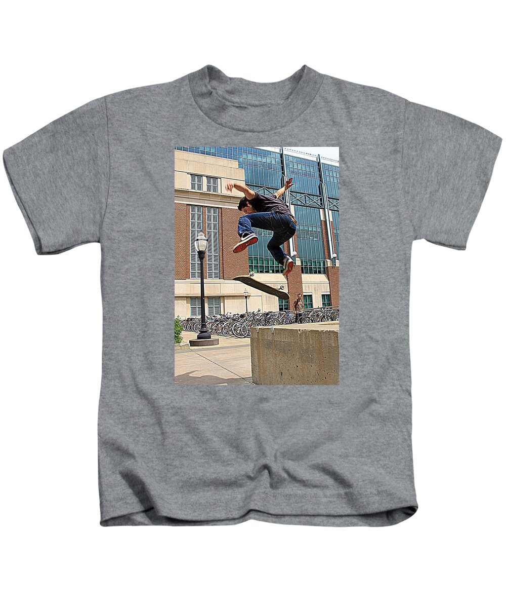 People Kids T-Shirt featuring the photograph Airborne by David Ralph Johnson