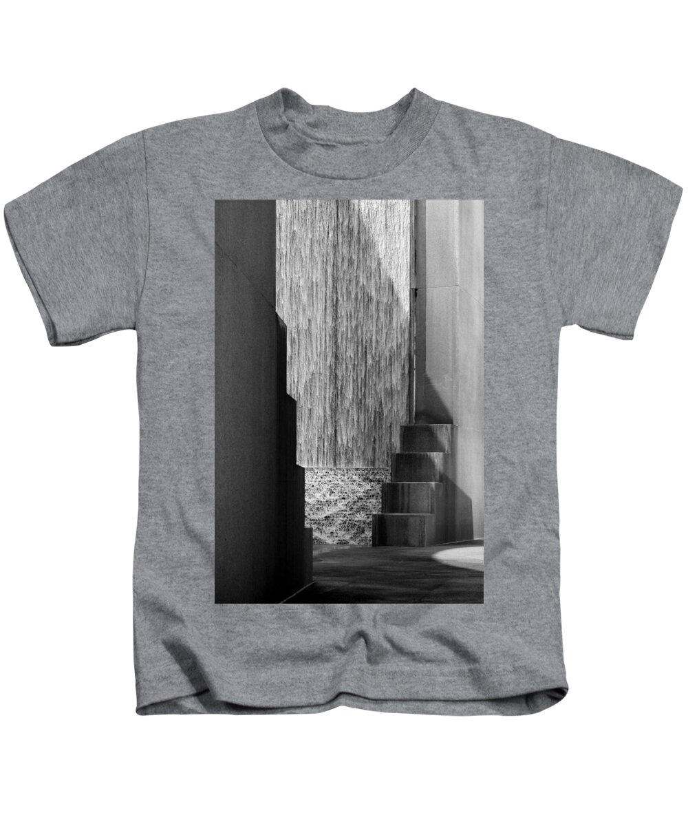 Houstonian Kids T-Shirt featuring the photograph Architectural Waterfall in Black and White by Angela Rath