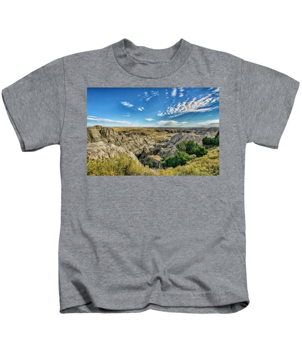  Kids T-Shirt featuring the photograph Bad Lands South Dakota.... by Paul Vitko