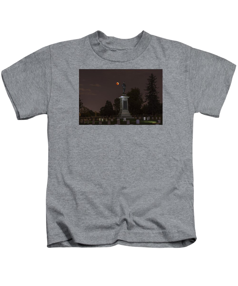 Lunar Eclipse Kids T-Shirt featuring the photograph Blood Moon at the Colorado Volunteers Memorial by Stephen Johnson
