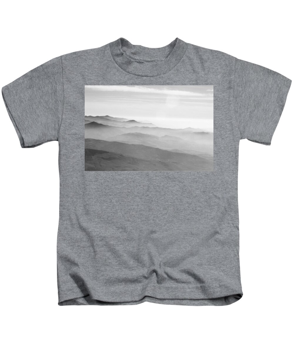Photo Kids T-Shirt featuring the photograph In the clouds over El Torcal by Roger Cummiskey