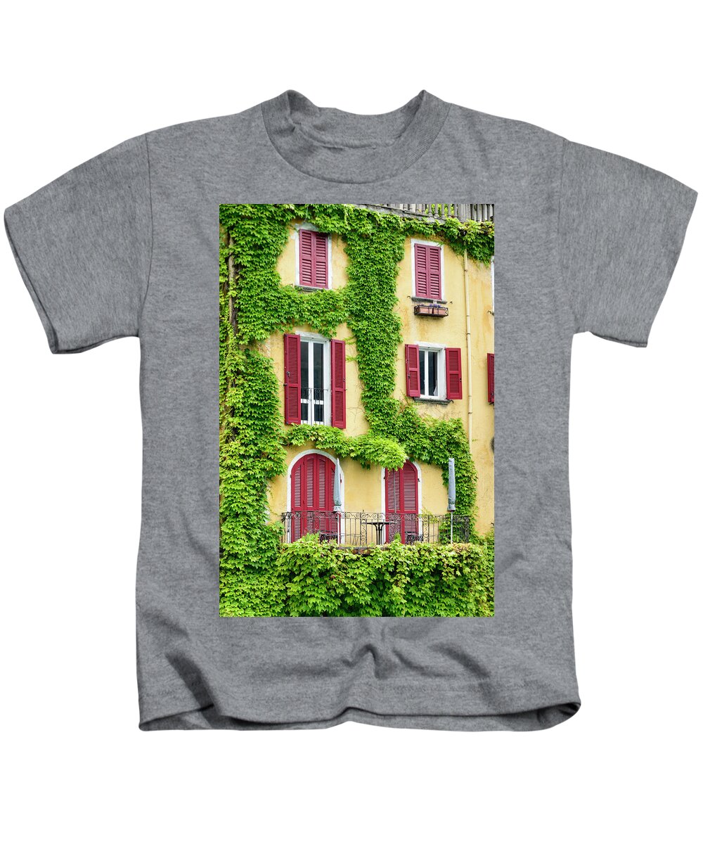 Architecture Kids T-Shirt featuring the photograph Ivy on Yellow Wall by Oscar Gutierrez