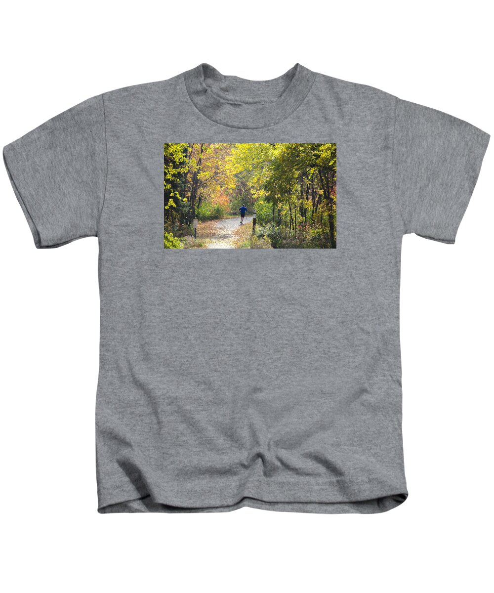 Digital Kids T-Shirt featuring the photograph Jogger on Nature Trail in Autumn by Lynn Hansen