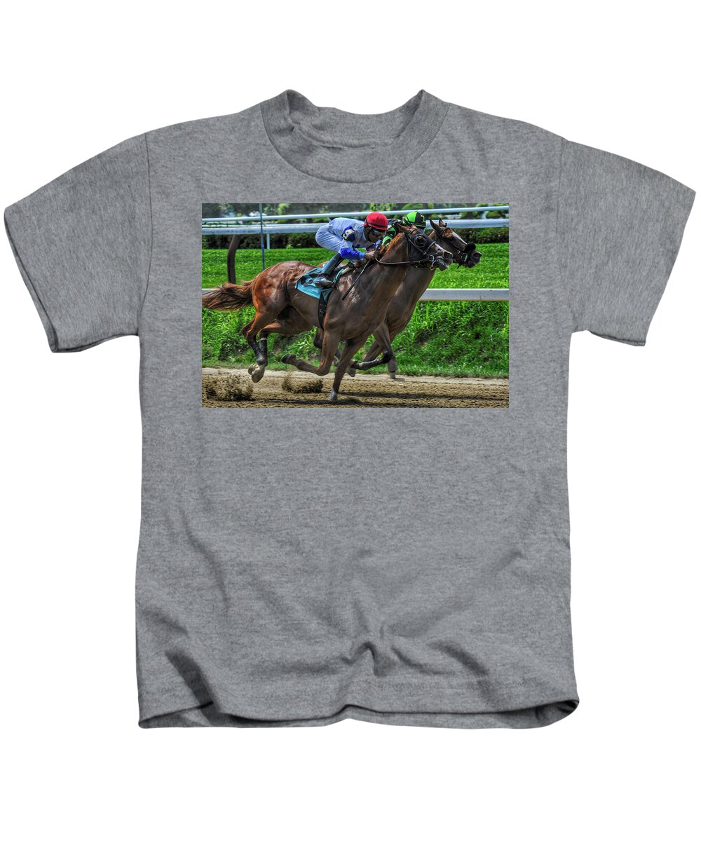 Horse Racing Kids T-Shirt featuring the photograph Nine Gaining by Jeffrey PERKINS