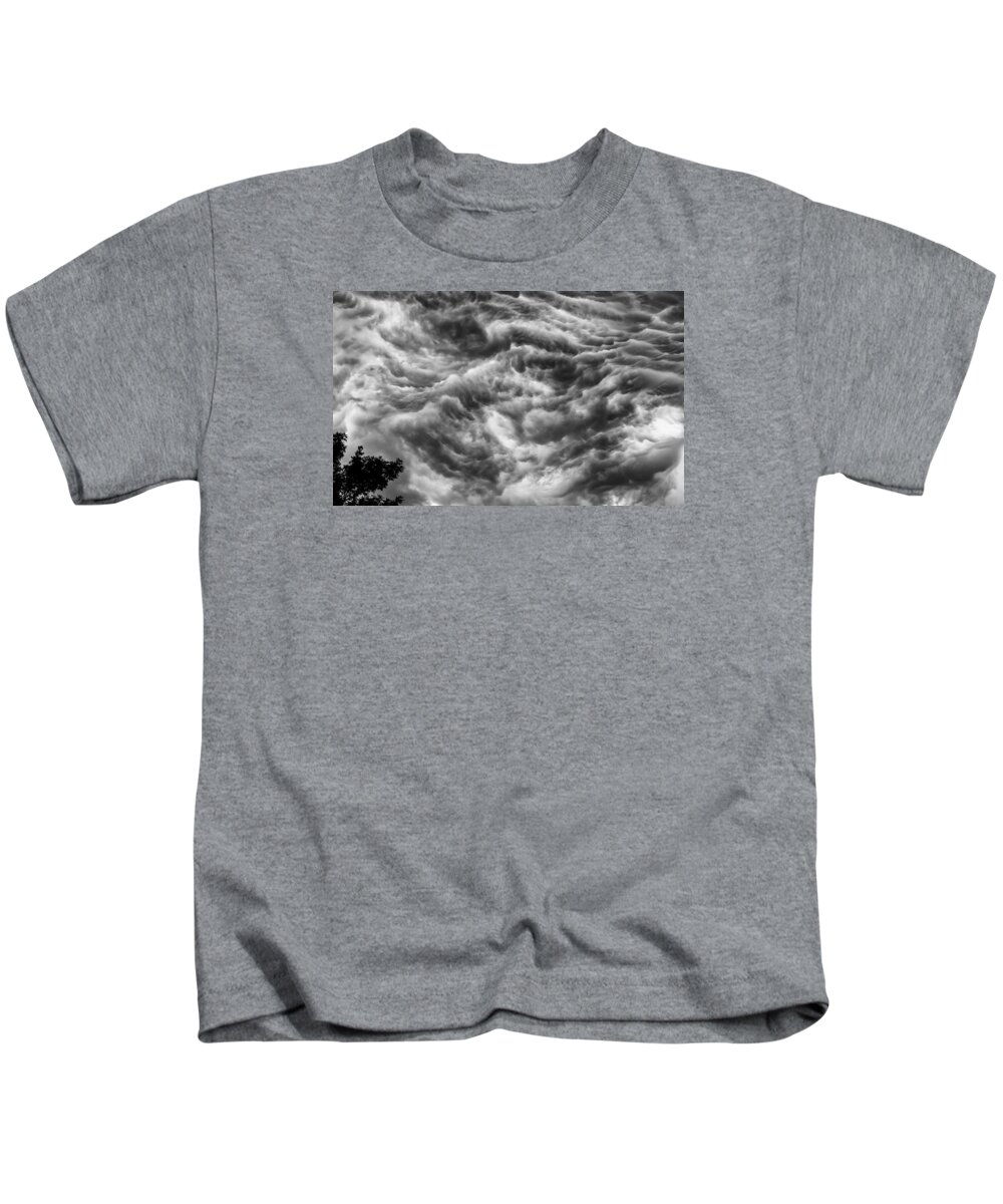 Storm Clouds Kids T-Shirt featuring the photograph No where to go by Charles McCleanon