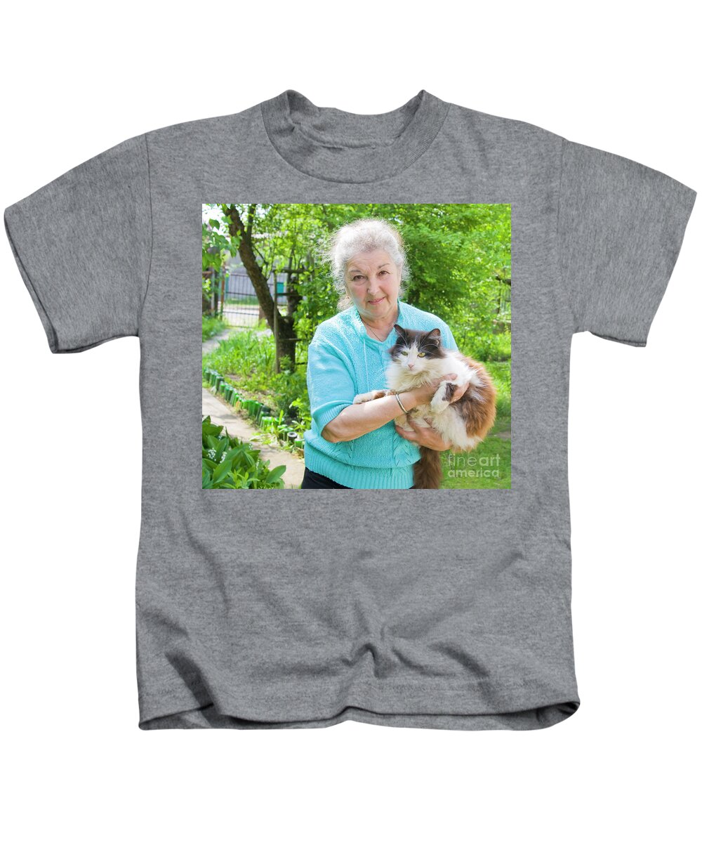 People Kids T-Shirt featuring the photograph Old lady with cat by Irina Afonskaya