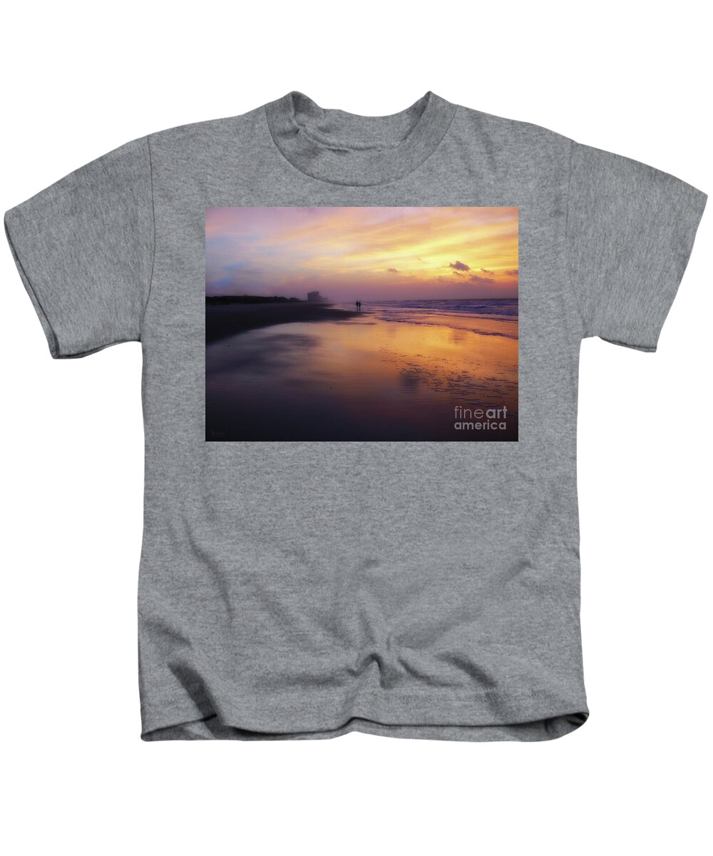 Sunset Kids T-Shirt featuring the photograph Sunset Walk On Myrtle Beach by Jeff Breiman