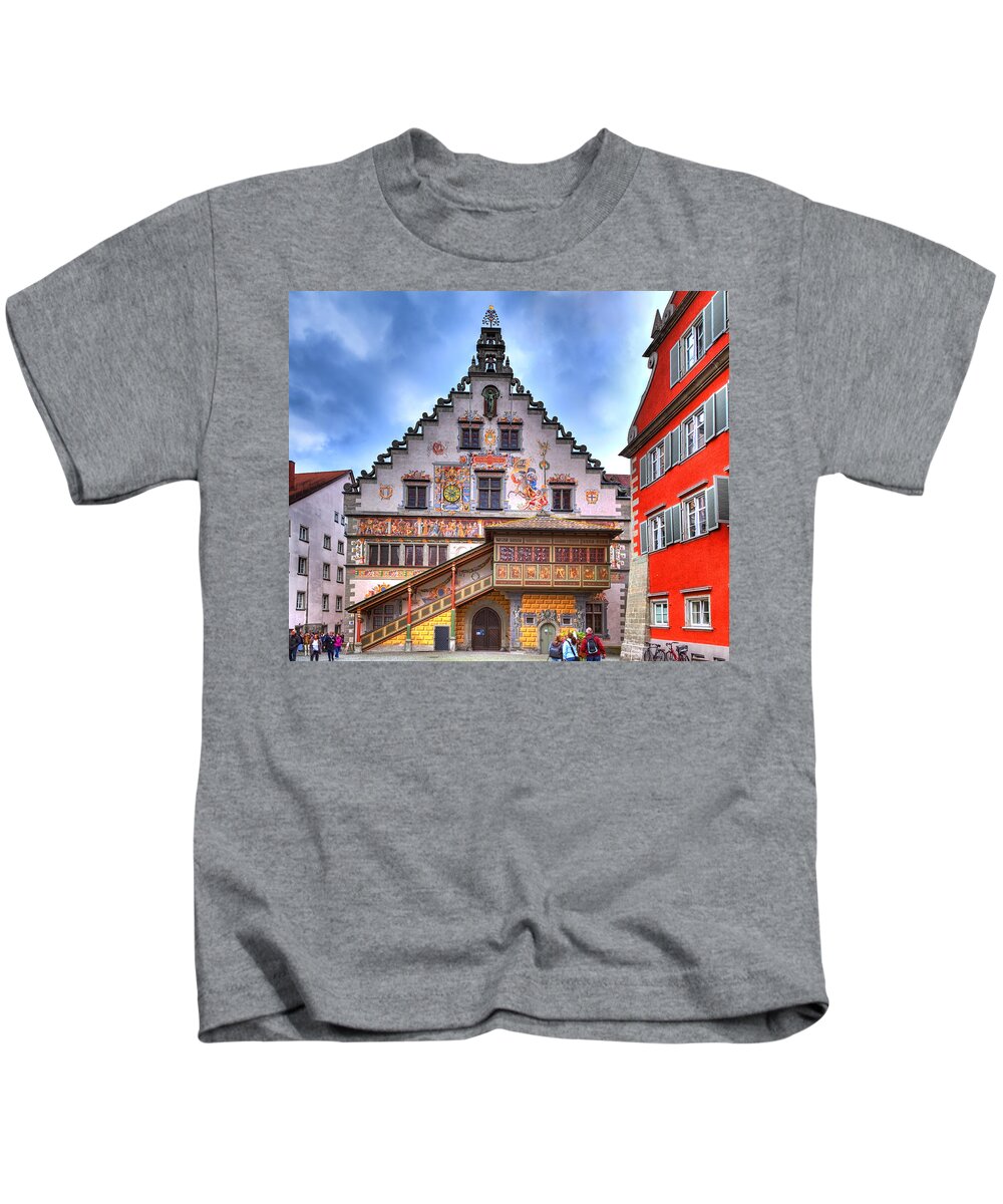 Antique Kids T-Shirt featuring the photograph the old townhall on the island of Lindau at the Lake Constance by Gina Koch