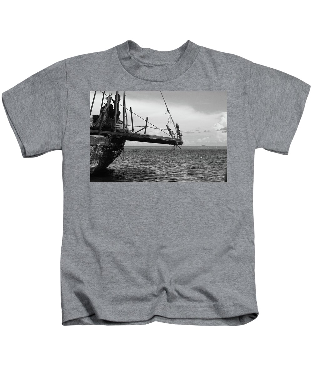 Traditional Indonesia Fishing Ship Boat Sea Sunlight Blackwhite Kalimantan Fish Old Woodship Woodboat Ocean Kids T-Shirt featuring the photograph Traditional Fishing Ship by Arvy Weindo Sianturi