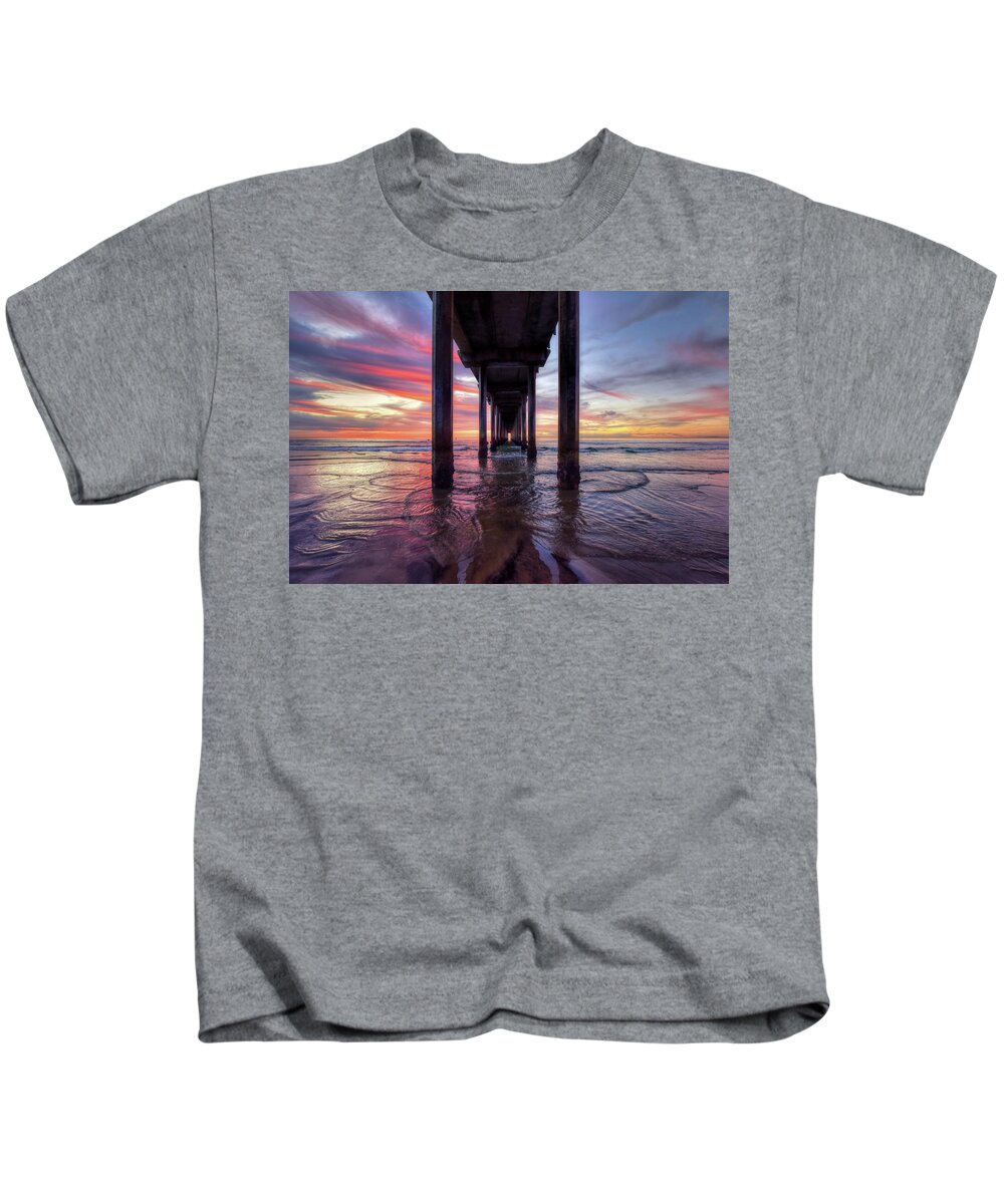 Mark Whitt Kids T-Shirt featuring the photograph Under the Pier Sunset by Mark Whitt