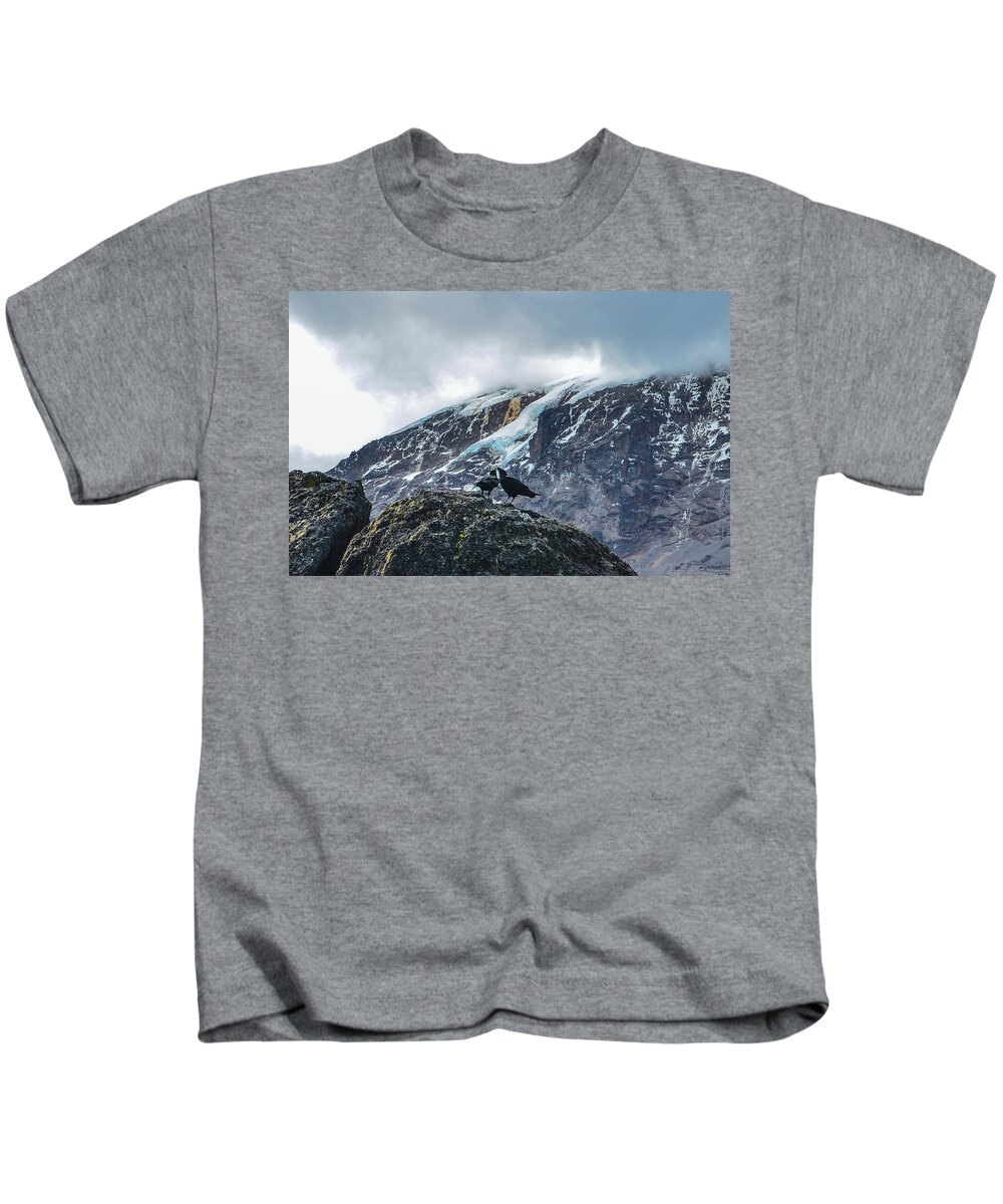 Africa Kids T-Shirt featuring the photograph White-Necked Raven Pair under Kilimanjaro Summit Glacier by Jeff at JSJ Photography