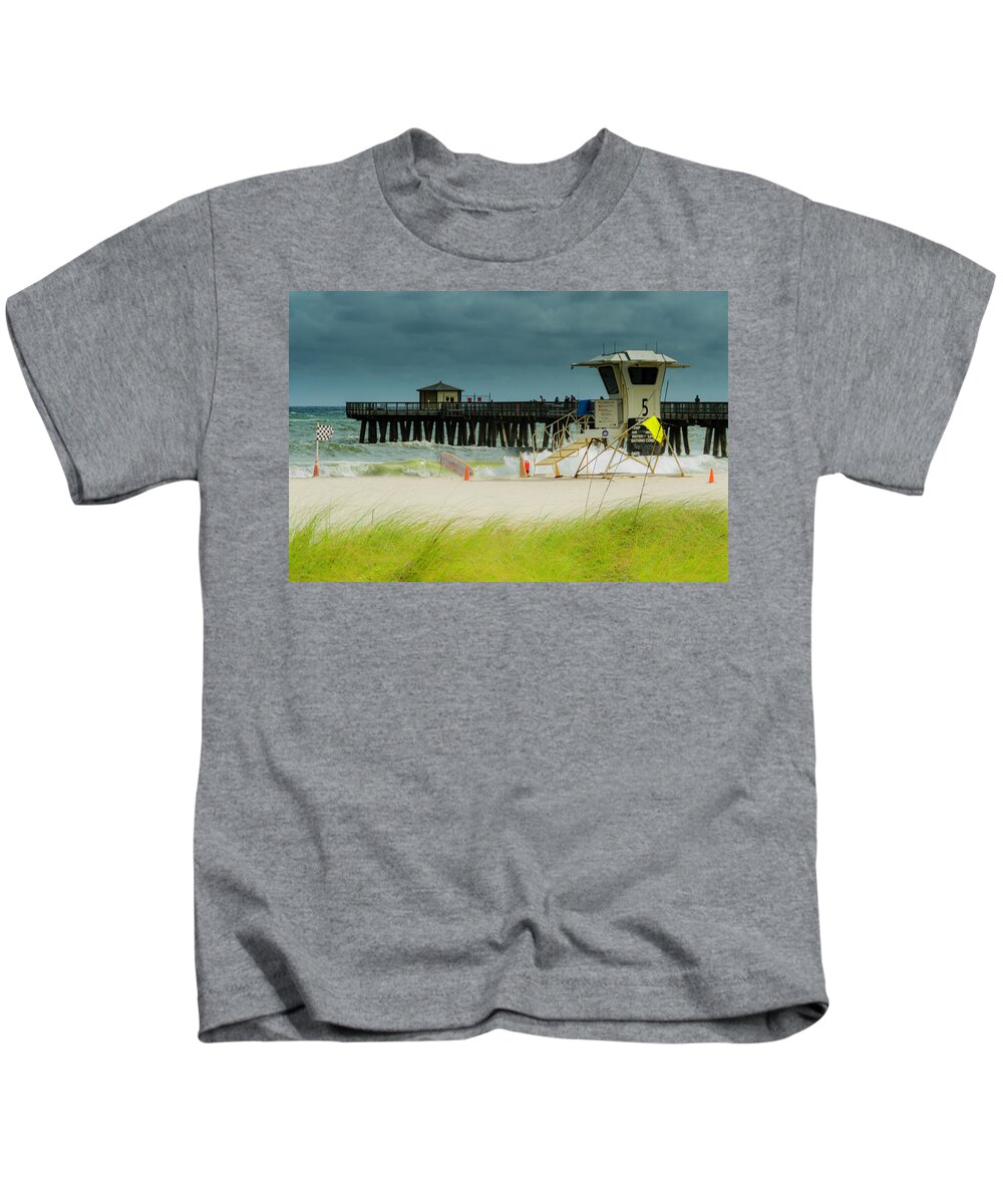 Lifeguard Station Kids T-Shirt featuring the photograph Windy day at the Pompano Pier by Wolfgang Stocker