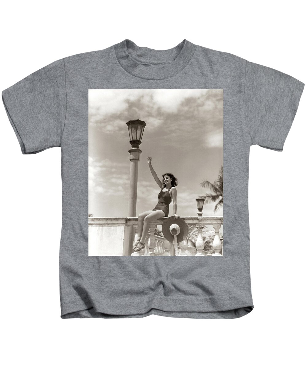 Photography Kids T-Shirt featuring the photograph 1930s 1940s Woman Bathing Suit Sun Hat by Vintage Images