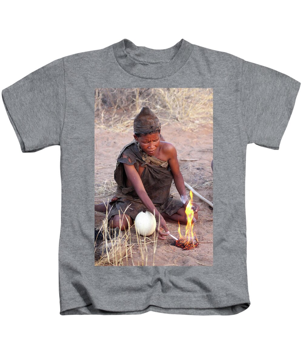  Kids T-Shirt featuring the photograph Making Fire by Eric Pengelly