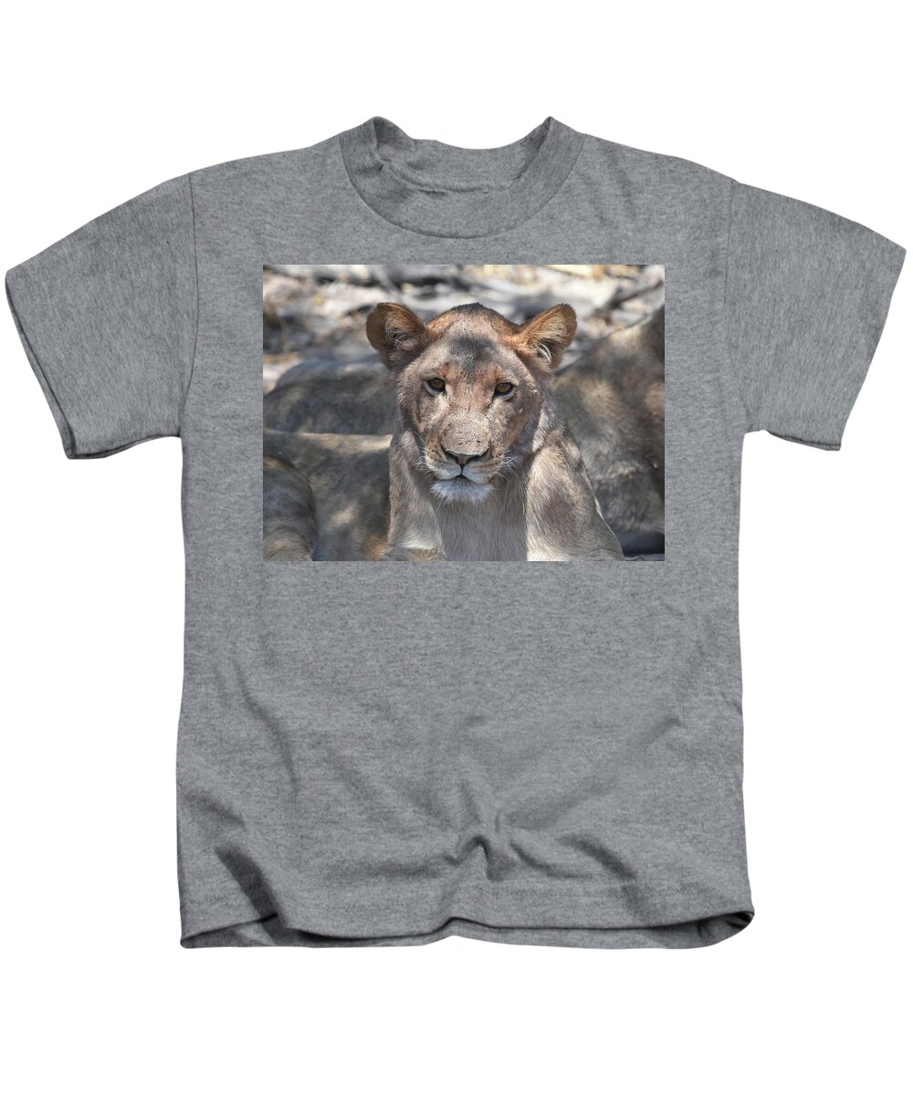 Lion Kids T-Shirt featuring the photograph Okavango Lioness by Ben Foster