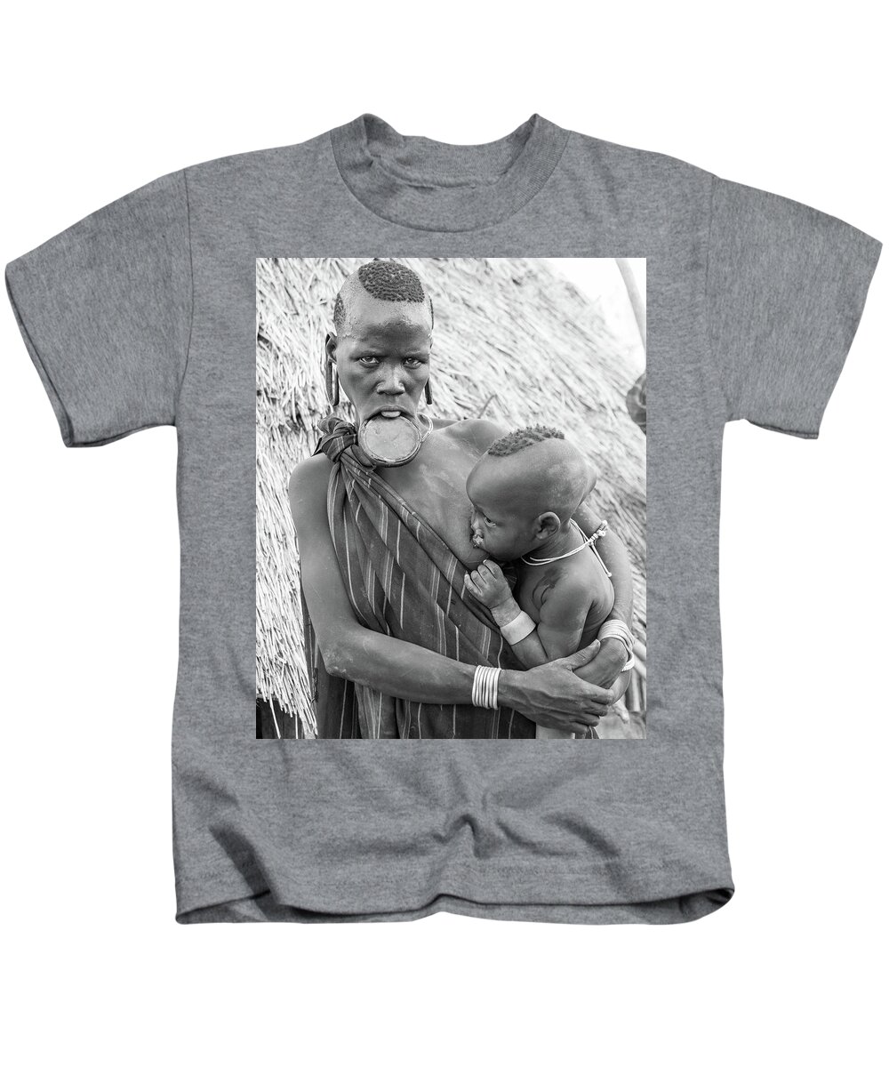Portrait Kids T-Shirt featuring the photograph Mursi Mother and child by Mache Del Campo