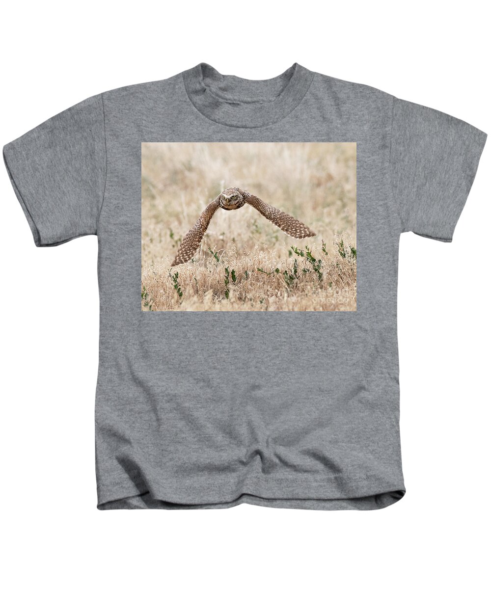 Bird Kids T-Shirt featuring the photograph Burrowing Owl on the Wing #2 by Dennis Hammer